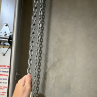 Porte à enroulement en acier étanche avec palan manuel 10 pi x 10 pi, robuste pour entrepôts à zone d'obscurcissement