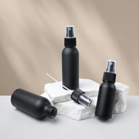 Bouteilles vides en aluminium de jet de protection solaire de parfum rechargeables 40ml 50ml 100ml 120ml 150ml bouteilles noires mates de liquide de l'eau avec la pompe