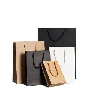 定制标志品牌可折叠硬质纸板包装磁性封口平板折叠纸礼品盒和高级纸袋