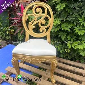 Good Selling Hollowed Out Pattern Oval Back Gold Stackable Decorative Wedding Plastic Dinning <b>Chair</b> - Product Image 1
