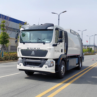 Compacteur de déchets électrique Howo 12CBM |   Batterie LFP 247 kWh |   Autonomie de 300 km |   4x2 |   Chargeur arrière |   Assainissement municipal Déchets urbains