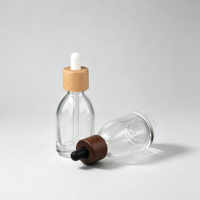 Flacon compte-gouttes rond en verre de luxe 30ml 50ml, flacon vide transparent pour sérum et huile essentielle avec bouchon compte-gouttes en bois pour emballage cosmétique