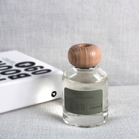 Bouteille diffuseur d'arômes cylindrique en verre transparent de luxe 120 ml, personnalisée par l'usine, avec bâtonnets diffuseurs pour parfum d'intérieur