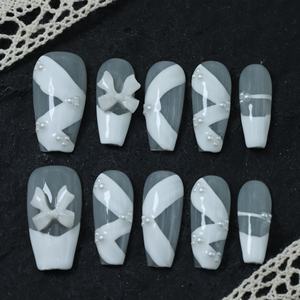 Prix d'usine Faux ongles à presser en acrylique de luxe faits main, style Y2K, avec strass, forme cercueil, couverture complète 3D, French manucure, réutilisables - Product Image 1