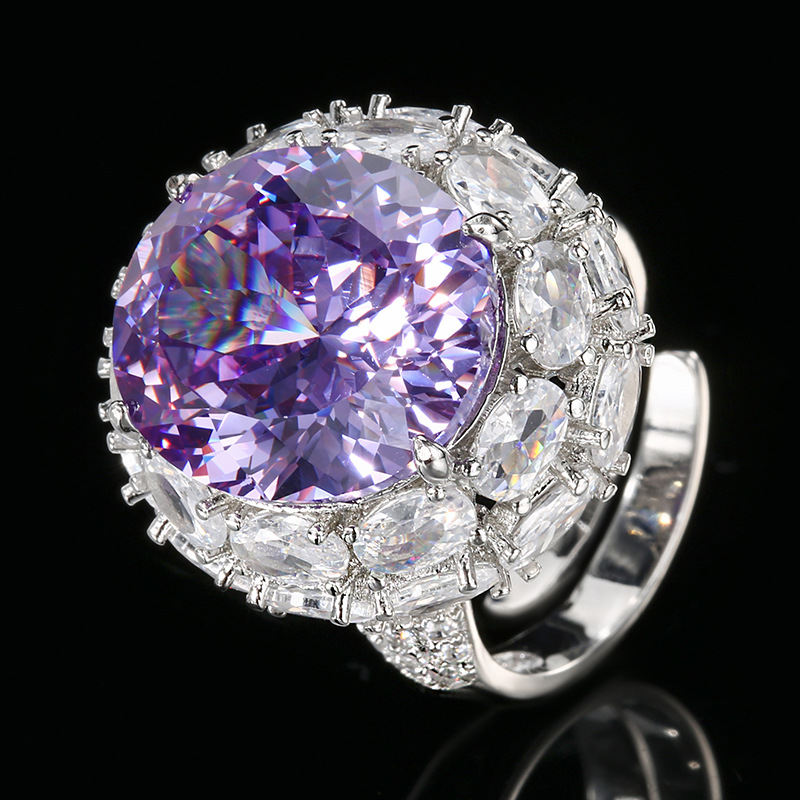 adjustable size Bird's Nest cut blue ring