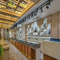 Goldrahmen Edelstahl-Schmuckvitrine Luxuriöse LED-Glas-Ausstellungsvitrine für Hochwertige Schmuckboutiquen