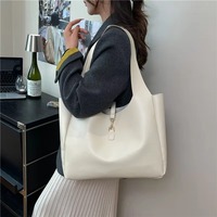 Sac à main seau vintage de créateur en cuir PU grande capacité pour femme avec serrure, idéal pour le shopping