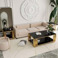 Table basse en verre noir élégant avec l'approvisionnement durable de B2B de construction de cadre d'or pour les détaillants internationaux
