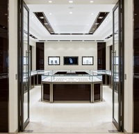 Comptoir d'îlot de présentation de bijoux de luxe sur mesure, cadre en acier inoxydable de qualité supérieure, vitrine à montres avec éclairage LED, durable, haute qualité, pour showroom