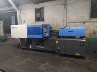 Machine de moulage par injection de plastique verticale hydraulique PLC et à engrenages d'occasion, 1200 tonnes, pour PET ABS PP/EPS, multifonctionnelle