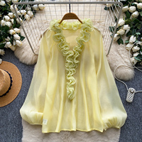 Chemise élégante à manches longues et volants pour femme, coupe ample avec nœud sur le devant, idéale pour le bureau et les trajets quotidiens, collection automne 2026