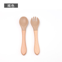 Cuillère en silicone de qualité alimentaire pour bébé avec manche en bois, cuillère souple pour apprendre au bébé à manger, silicone de qualité alimentaire