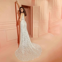 Robes de mariée sirène de plage sexy personnalisées à col en V Bretelles spaghetti Robes de mariée Dos nu