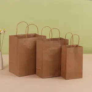 Bolsas de papel marrón con asas Tamaños surtidos Tamaños mixtos Bolsas de mercancía de regalo de papel Kraft a granel para negocios
