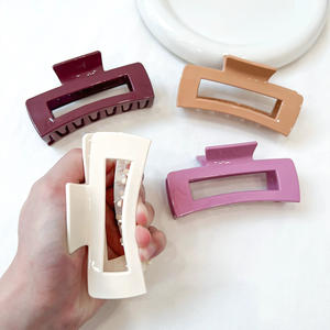 Pinza de pelo grande triangular con logotipo personalizado de alta calidad, goma Flexible antiarañazos, accesorios irrompibles, pinza de garra de silicona suave - Product Image 6