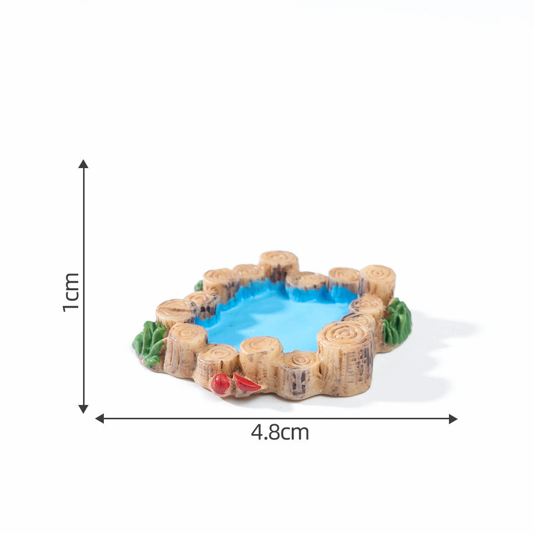 Bassin avec piquets en bois