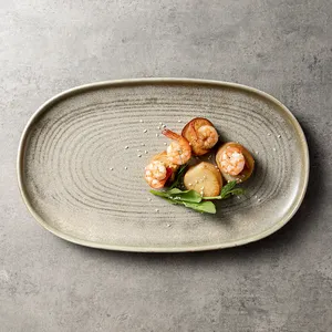 Plateau de restaurant Vajilla De Porcelana Coupe ovale Assiettes en porcelaine pour sushi japonais Rétro Assiettes de service de poisson en céramique