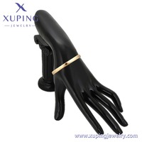 X000968605 XUPING Bracelet jonc minimaliste pour femme, en alliage de cuivre écologique plaqué or 14K, lisse et articulé, pour usage quotidien