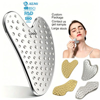 Planche de massage Gua Sha en acier inoxydable texturé nid d'abeille en forme de cœur, outil de beauté pour lifting facial en forme de V