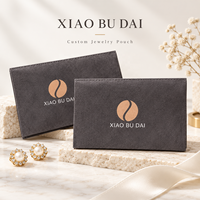 Pochette à bijoux en microfibre disponible en sept couleurs : brun charbon, ivoire, rose, vert, bleu, lilas, OEM ODM