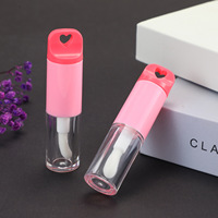 Nouveau style de tube de brillant à lèvres en plastique en forme de cœur avec grande brosse applicatrice, outil de séparation, emballage cosmétique, tube de gloss à lèvres