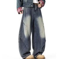 Jean en denim pour homme, coupe slim, avec détails de couture motif lémur, provenance Madagascar, vente en gros