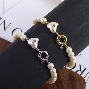 Pulsera de Perlas Chapada en Oro con Forma de Corazón, Estilo Vivienne Empress Dowager, Joyería Europea Americana de Calidad Superior - Product Image 1
