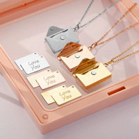 Bijoux fantaisie en stock, logo personnalisé, photo, gravure imperméable, pendentif médaillon d'amour, plaqué or 18 carats, argent, enveloppe vide, collier