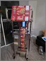 Équipement d'emballage automatique vertical en acier inoxydable pour l'emballage de noix, granulés, liquides et huiles comestibles en sachets