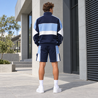 Ensemble personnalisé pull et short pour homme en tissu French Terry, col montant demi-zippé, design à empiècements color block, pour le quotidien et le streetwear