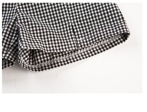 Nouveaux vêtements pour enfants en gros, mode indienne, ensemble haut sans manches en coton blanc avec nœud et short à carreaux pour fille - Product Image 3
