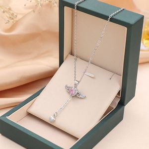Rfjewel แฟชั่นคลาสสิกหัวใจพู่เคลื่อนไหวปีกสแตนเลสทอง/เงินชุบสร้อยคอจี้ - Product Image 3