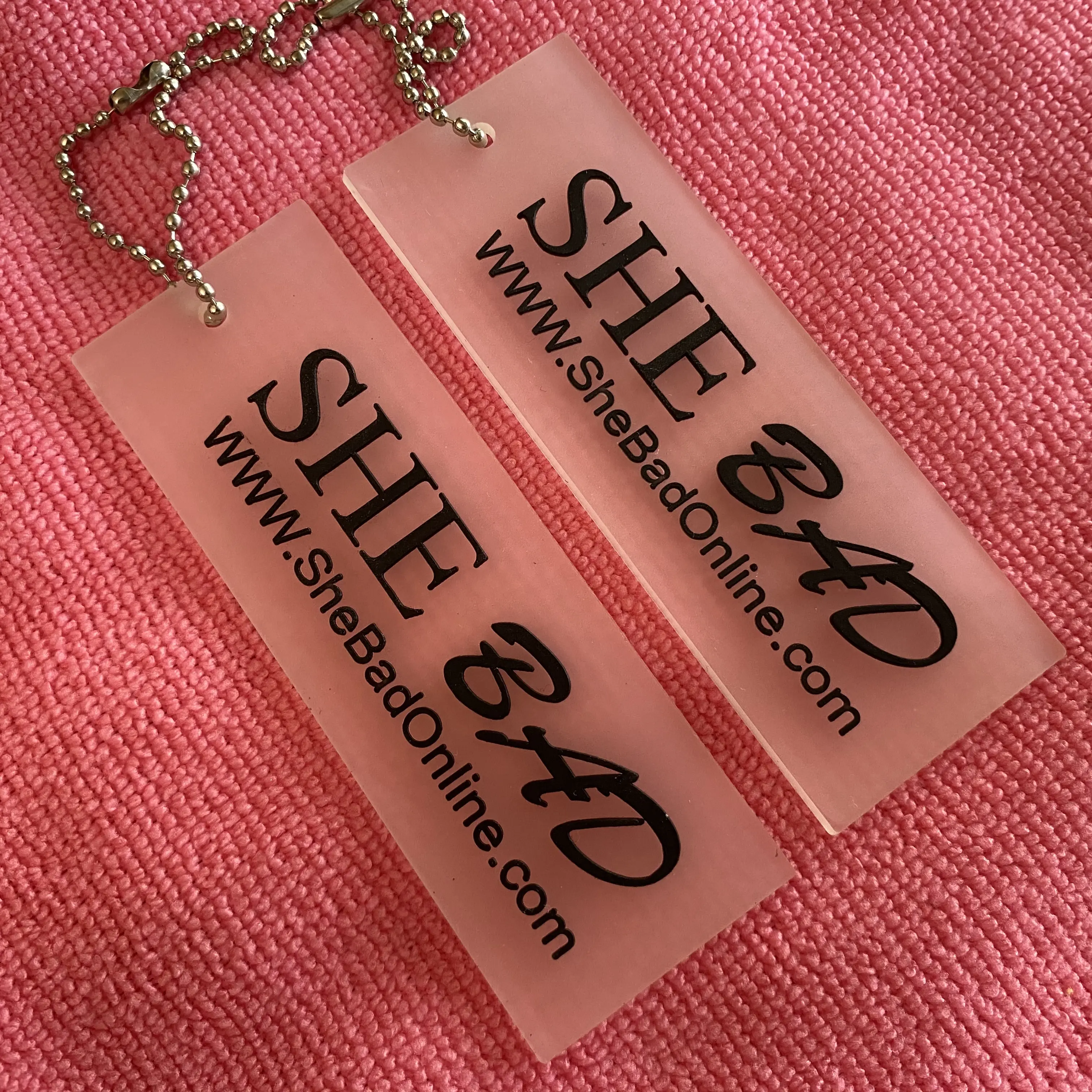 2mm thickness company logo transparent rubber swing tag,durable soft clear PVC rubber hangtag for clothing