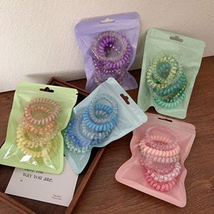 Attaches à <span class=keywords><strong>cheveux</strong></span> en fil de téléphone en silicone avec bobine bouclée de créateur attaches à <span class=keywords><strong>cheveux</strong></span> en <span class=keywords><strong>spirale</strong></span> pour enfants coréens mignons élastiques en plastique pour <span class=keywords><strong>cheveux</strong></span> de filles - Product Image 5