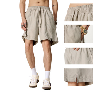 Shorts de course pour hommes en polyester à séchage rapide, imperméables, avec cordon de serrage, poches, logo personnalisé, coupe ample, pour la gym et l'entraînement sportif - Product Image 2