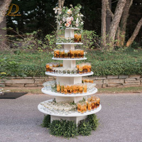 JINDA Nouveau support de présentation pour flûtes à champagne en PVC blanc rond à 4 niveaux, support pour verres à cocktail pour mariage, fête, décoration d'événements