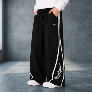 Pantalon de survêtement noir pour homme, coupe large, taille élastique, bande latérale, respirant, décontracté, pour l'automne - Product Image 3