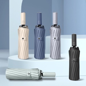 Paraguas plegable de tres pliegues, 16 varillas, apertura automática, resistente a los rayos UV, nailon, diseño minimalista para viajes, uso en días soleados y lluviosos - Product Image 1