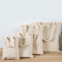 Sac fourre-tout réutilisable personnalisé en toile de coton bio avec bandoulière, emballage sur mesure et respectueux de l'environnement