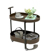 Table d'appoint mobile double couche moderne et légère et luxueuse Table basse ovale avec roulettes Support de rangement simple Design métallique
