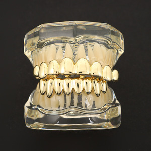 Grillz Hip Hop irréguliers à huit dents pour hommes et femmes, accessoires dentaires plaqués or brillant - Product Image 1