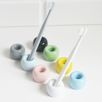 Support de brosse à dents en céramique miniature nordique en gros, forme ronde, en ensembles de salle de bain colorés