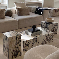 Guanmay Table italienne de luxe personnalisée en marbre Calacatta Grande table basse moderne à plateforme en pierre d'alto pour l'exposition de salon