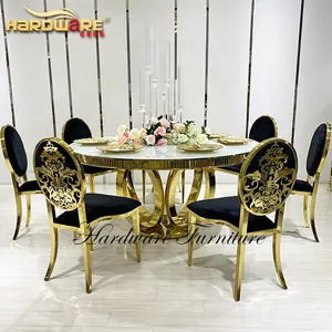 White glass top round golden stainless steel metal base wedding dining table
