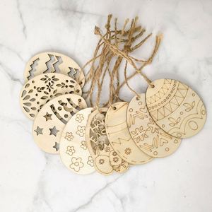 Œuf de Pâques en bois fait main en gros avec corde de chanvre, copeaux de bois gravés en forme de lapin pour décorations de fête, livraison directe - Product Image 1