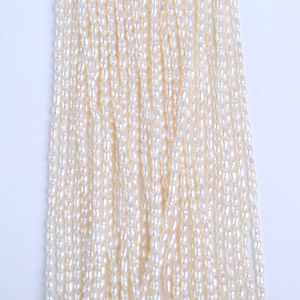 Perles en vrac semi-finies en forme de riz blanc de 2-2,5 mm pour la fabrication de bijoux faits main – Accessoires de petite taille fournis par le fabricant - Product Image 2