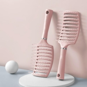 Brosse à cheveux démêlante incurvée en nylon plastique personnalisée, portable, pour cheveux secs et humides, vente en gros - Product Image 1