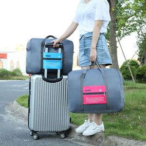 Sac de voyage pliable en nylon imperméable de style coréen, sac de rangement créatif pour avion, sac à roulettes, capacité 20-35L, respirant - Product Image 4