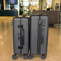 Vente en gros de valise de transport rigide de luxe en fibre de carbone 100% véritable polycarbonate personnalisé avec fermeture de cadre en aluminium