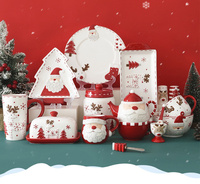 Service de table en céramique gaufrée style artisanal de Noël, motif Père Noël et rennes brodés, comprenant tasse, théière, beurrier et plat de service, vente en gros
